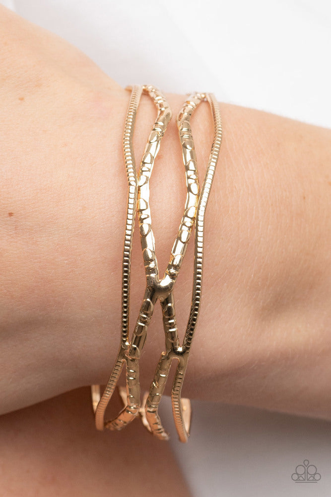 ​A Narrow ESCAPADE Bracelet - Gold | Paparazzi Accessories