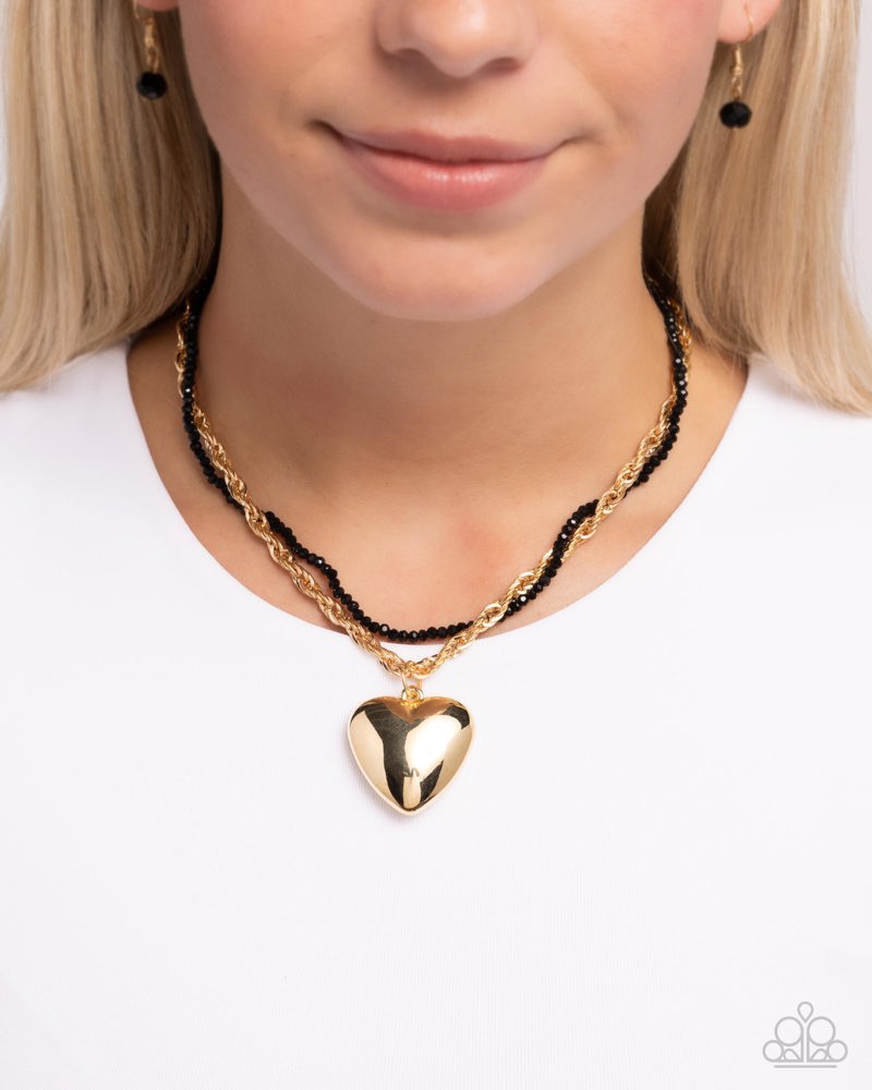 Falling Slowly - Gold | Paparazzi Accessories