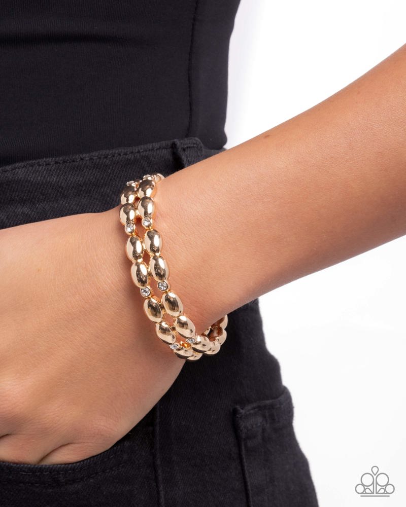 Stacked Statement - Gold | Paparazzi Accessories