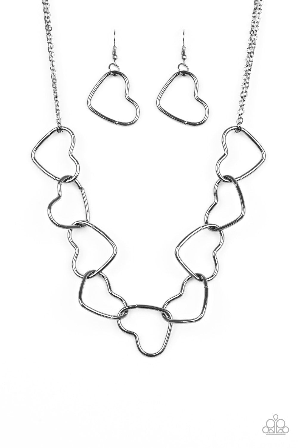 Paparazzi Unbreak My Heart - Black Necklace Airy gunmetal heart silhouettes connect below the collar for a flirtatious look. Sold as one individual black necklace. Includes one pair of matching earrings.