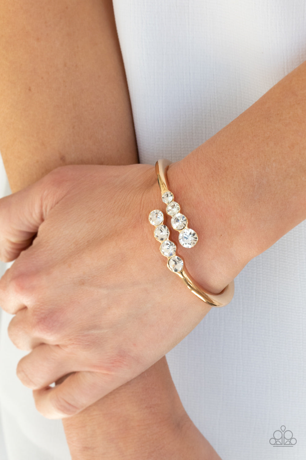 Paparazzi Defying Dazzle - Gold Bracelet - Pusher P