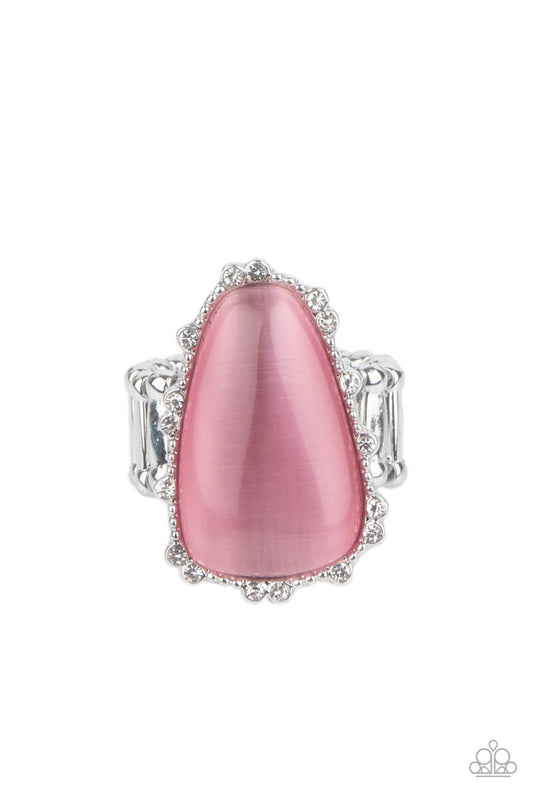 Paparazzi Jewelry Newport Nouveau - Pink Ring Pusher P A tranquil asymmetrical pink cat's eye stone is encased in a delicately dotted shimmery silver frame.Features a stretchy band for a flexible fit. Sold as one individual ring.