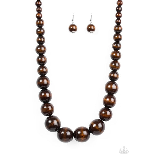 Paparazzi Effortlessly Everglades - Brown Necklace Gradually increasing in size near the center, earthy wooden beads are threaded along a brown string for a summery look. Features an adjustable sliding knot closure. Sold as one individual necklace. Includes one pair of matching earrings. Paparazzi Accessories are all Lead Free and Nickel Free