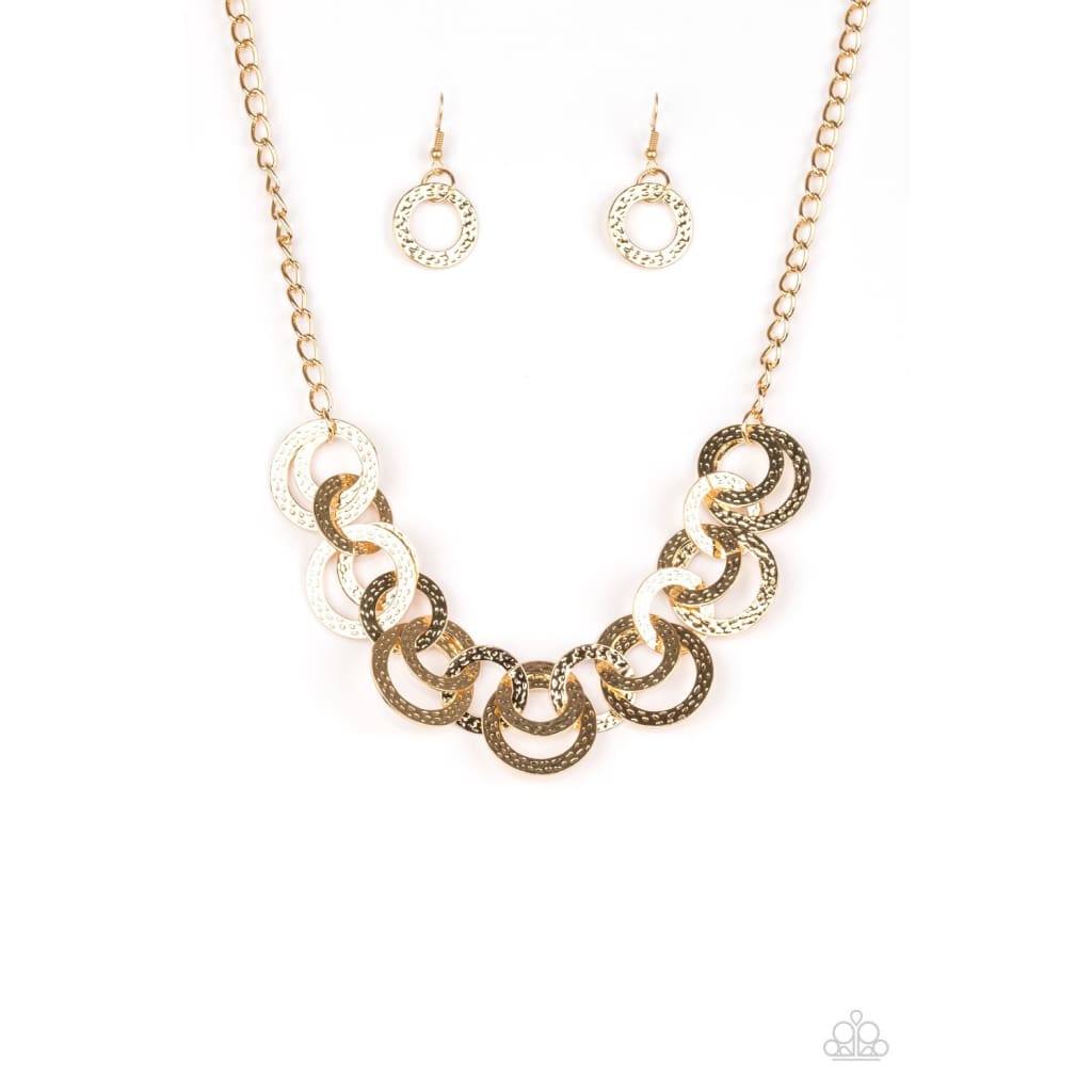 Paparazzi Treasure Tease Gold